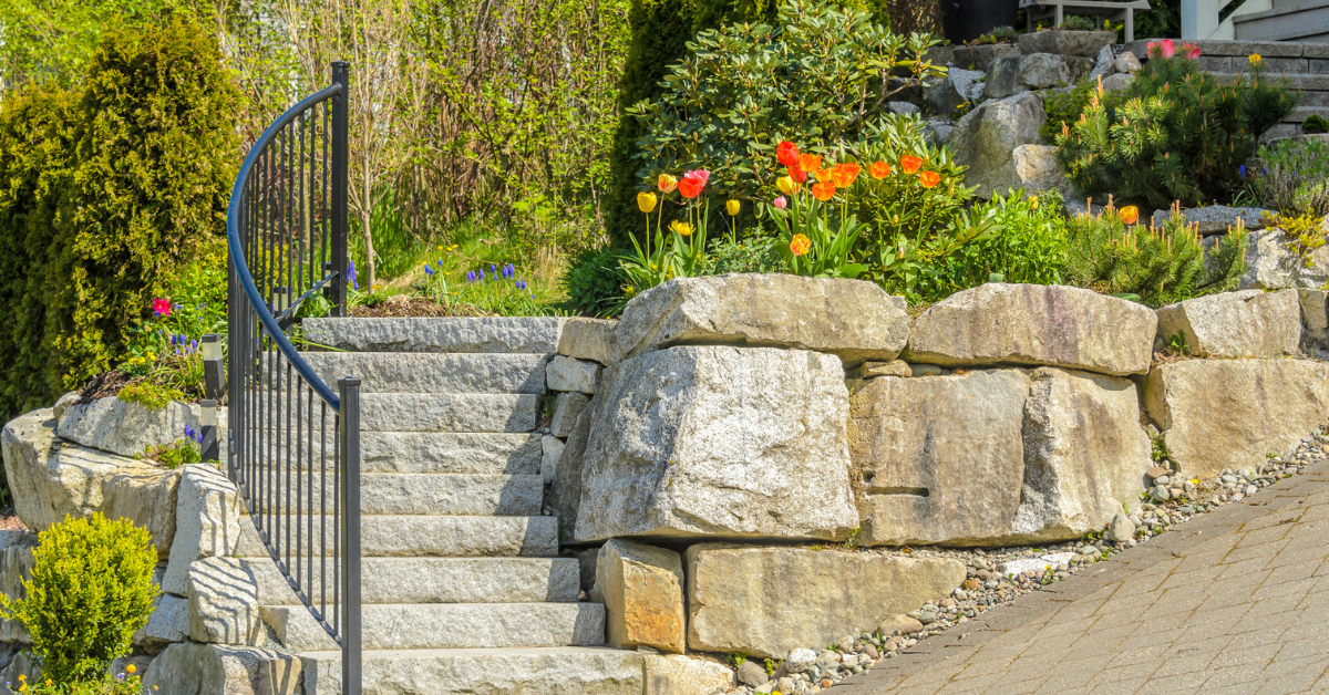 How Retaining Walls Solve Your Sloped Yard Problems